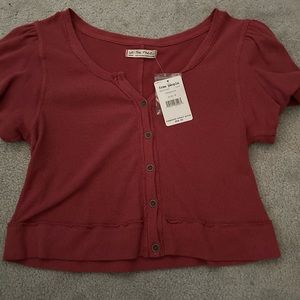 Never worn, tags on. Free people size medium